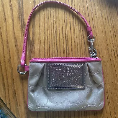 EUC Coach Poppy Signature C Wristlet Khaki Gold With Pink Leather Trim • $21