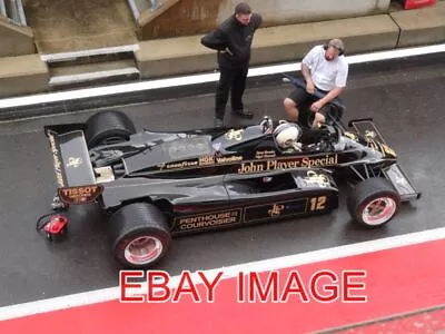 Photo  Steve Brooks Sits In The Pitlane In His Ex-mansell Lotus 91 Before Qualif • £2