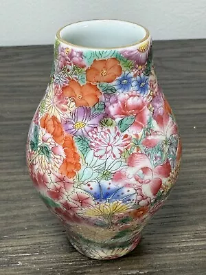 3.5” Qing Dynasty Porcelain Multicolor Enamel Ten Thousand Flower Vase • $50