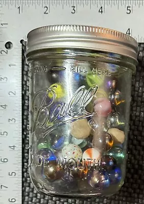 Ball Jar With Marbles In It • $5