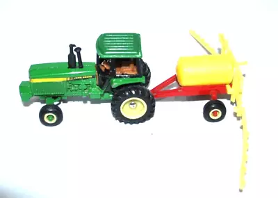 ERTL John Deere 4440 Die Cast Tractor And Red International Sprayer 1/64 Scale. • $12