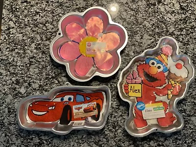 Wilton Dancing Daisy Lightning McQueen And Elmo Cake Pans Lot Of 3 • £15.42