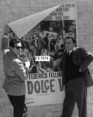 Marcello Mastroianni And Federico Fellini With A Poster Of  La Dolce Vita  • $10.99