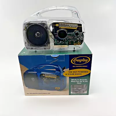 $64.64 • Buy Freeplay Self Powered AM/FM Radio Solar Power Crank Clear Solar NEW MIB