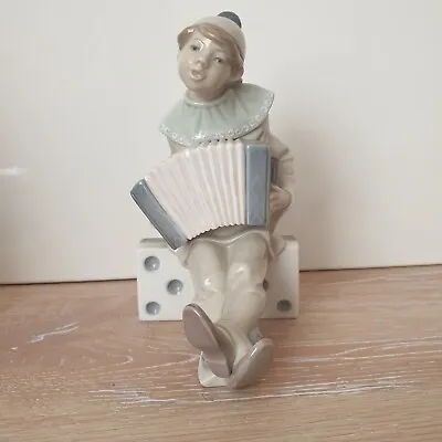 Lladro Nao Clown Playing A Accordian Sitting On A Domimo  • £15