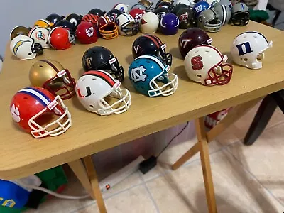 Lot Of 9  Riddell NCAA Pocket Size College Football Team Helmets Miniature • $24.99