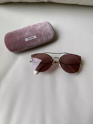 Miu Miu Pink Lens Sunglasses  • £75