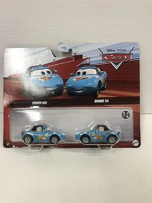 Disney Cars Dinogo Mia & Dinogo Tia Diecast Car 1:55 2 Pack DXV99 GKB77 NEW! • $13.99