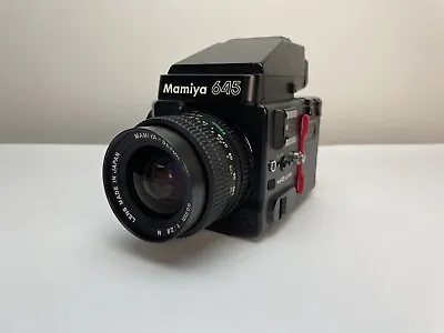 Mamiya 645 Super + Prism Finder + Sekor N 55mm F2.8 + 120 Back + Polaroid Back • $643.82