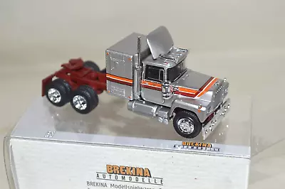 1:87 HO Scale Brekina 85809 Mack RS 700  Tractor Truck SILVER/RED/ORANGE • $29