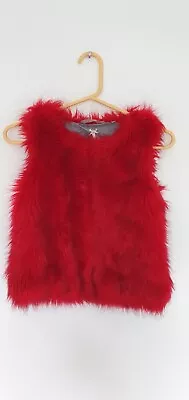 Girl Red Fur Gilet • £3.50