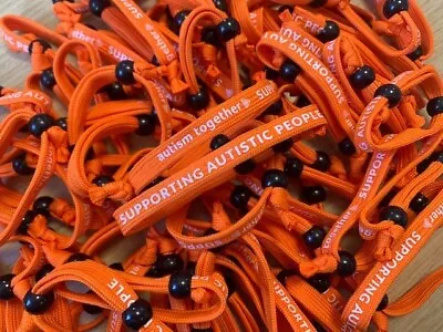 £2 • Buy Charity Fabric Wristband Autism Acceptance Orange Adjustable