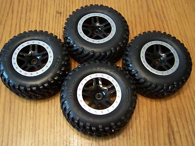 Fits Traxxas 1/10 Slash 4x4 Spec Tires Black Split Spoke Wheels Silver Ring 12mm • $36.82