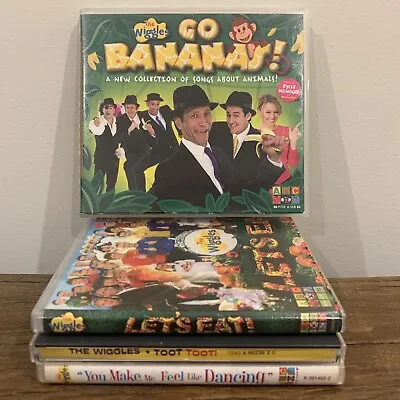 Bundle Of 4 Wiggles' CDs - Toot Toot Go Bananas Let’s Eat & Feel Like Dancing • $30