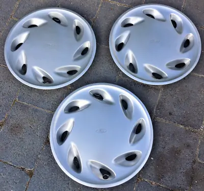 FORD WHEEL COVER/HUBCAPS 14 INCH USED X 3 • $195