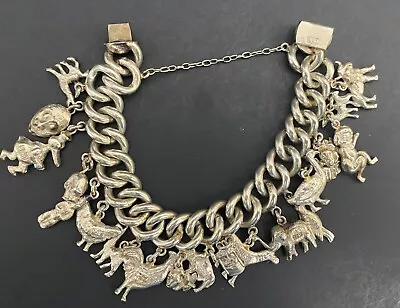 Heavy 925 Silver Vintage Charm Bracelet Twenty Different Cool Charms Marked 925 • $310