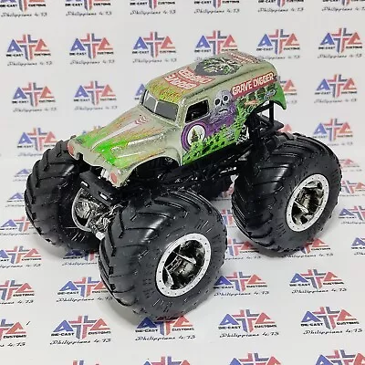 Chrome GRAVE DIGGER Customized Hot Wheels Monster Jam Truck 1/64 • $6.99