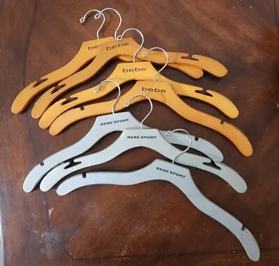 Vintage BEBE Wooden Clothes Hangers Lot Grip & No Grip Bebe Sport Grey Brown • $38