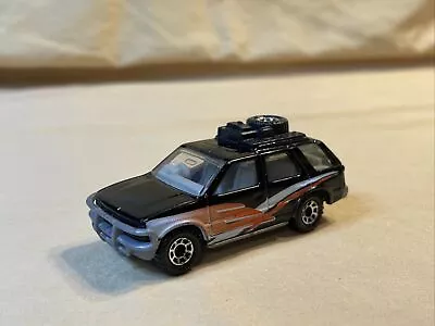 Matchbox 1994 Isuzu Rodeo Black With Red & White Tampo Tire On Top • $7.59