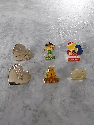 6 Charity Pin Badges  Variety Club NSPCC  Marie Curie  Childline  • £3