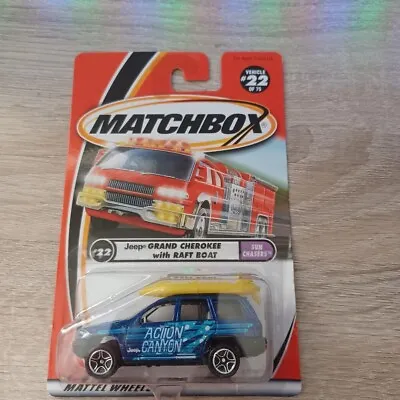 Matchbox 1/64 Diecast Sun Chasers #22/75 Blue Jeep Grand Cherokee With Raft Boat • $2.90