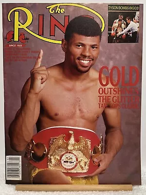 The Ring: Gold Outshines The Glitter Tate Tops Olajide/tyson Bombs Biggs Feb 88' • $8.95