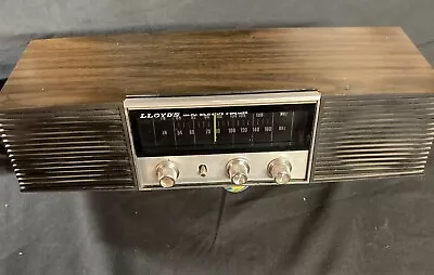 Vintage Lloyd's  Woodgrain AM FM  Radio RR-6561  Working Series 187 • $26.50