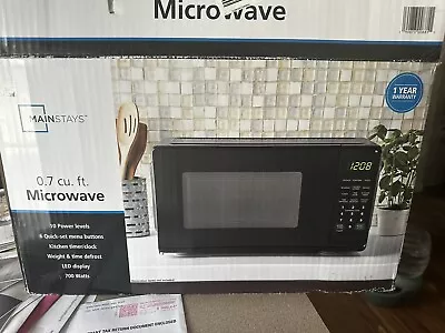 Mainstays 0.7 Cu Ft 700-Watt Compact Countertop Microwave Oven • $30