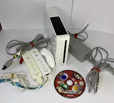 Nintendo Wii Console + Super Mario Bros. Wii. • $50