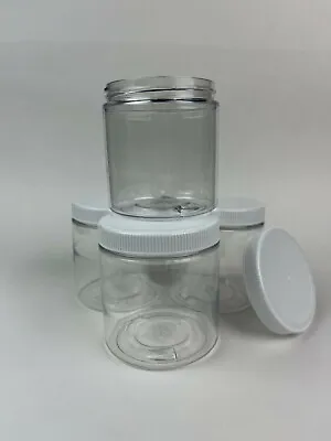 Four 8 Oz Clear Plastic Jars With White Lids • $7.99