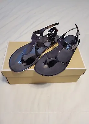 Women Michael Kors MK Plate Jelly Flat Buckle Up Sandals PVC Smoke Gray • $49.99