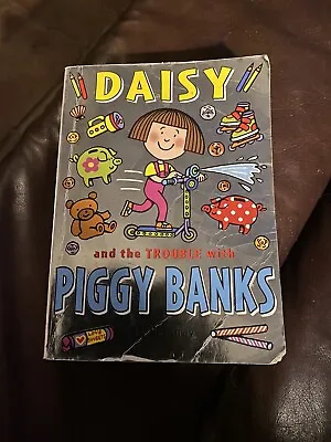 Daisy And The Trouble With Piggy Banks (PB) • £1.50