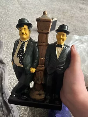 Laurel And Hardy Figures Standing At Lights  • £0.99