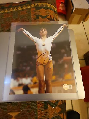 Nadia Comaneci Autographed Signed 8x10 Photo Beckett BAS COA Olympics AUTO • $25