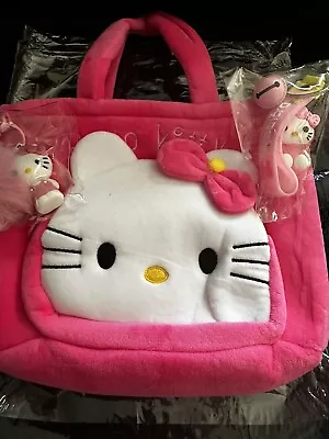 Hello Kitty Key Chain 4  & Plush Bag. • $19.99