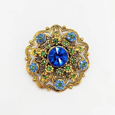 Vintage West Germany Brooch Blue And Green Rhinestone Gold Tone Filigree Pin • $39