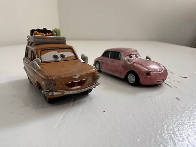 Disney Pixar Cars 2 Lot Of 2 Diecast 1:55 Cars Lubewig And Geartrude • $25