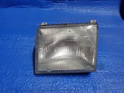 Mercedes-Benz Headlight Lens W/ Bulb W124 Left Side 003-826-22-90 • $85