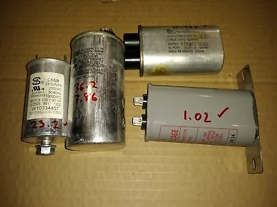 9ff50 Assorted Capacitors: 250v/23.5mf 350v/7.5 + 35mf 1900v / 0.97mf 2100v/0 • $19.99
