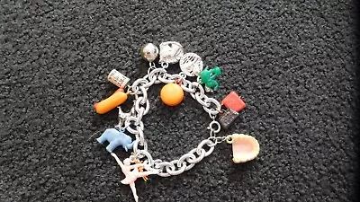 Vintage 1950’s Charm Bracelet With 15 Plastic Charms Cracker Jack? Brass 8” • $39.99