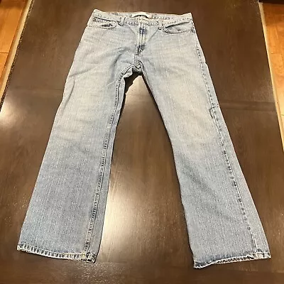 Vintage Distressed Levis 527 Low Rise Boot Cut Mens Jeans Fit 36x32 Light Wash • $26.99