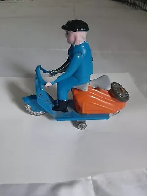 Vintage Tin Man Riding Scooter • $19