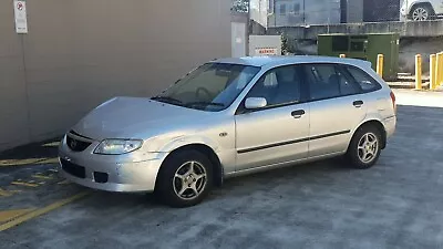 2001 Mazda 323 Wrecking - 1.6 Automatic Silver Alloys Air Con Power Options • $1000