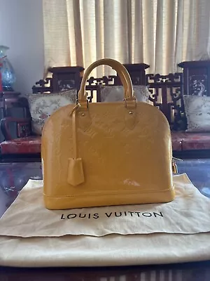 Louis Vuitton M91695 Vernis Alma Jaune Passion Yellow Handbag • $1099.99