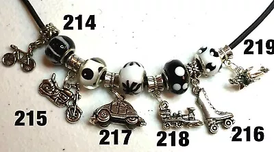 Pick A Charm: DOG CAT PAW BOY GIRL BICYCLE MOTORCYCLE SKATE TRAIN BI-PLANE • $1.95