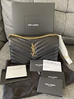 Ysl CLASSIC CASSANDRE WOC Black And Gold + Store Receipt • $1850