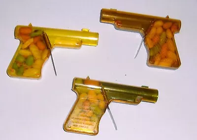 3 Pre Owned Vintage Hard Plastic Gun Pistol Candy Containers Unused • $19.99