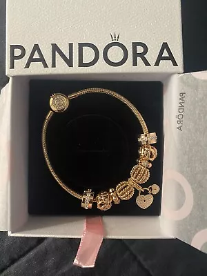 PANDORA Rose Gold Bracelet & Charms • $335