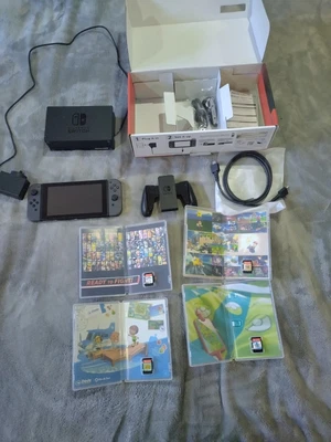 $200 • Buy Nintendo Switch 32GB Grey Joy-Con Console (2019) With 4 Games Included