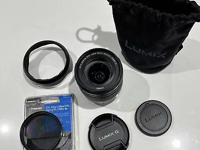 Panasonic Lumix G 12-60mm F/3.5-5.6 Power O.I.S. Lens + Hood + Pouch + Filter • £165